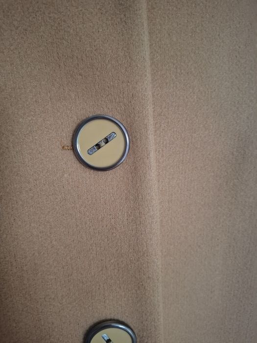 Elegancki modny płaszczyk damski