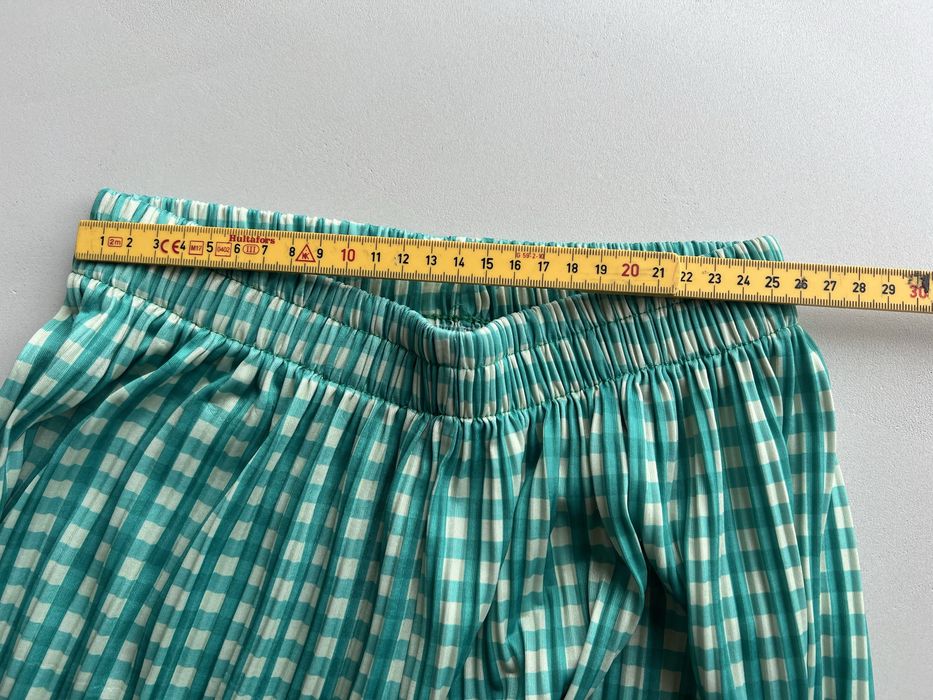 Elastyczne materiałowe spodnie w kratkę vintage