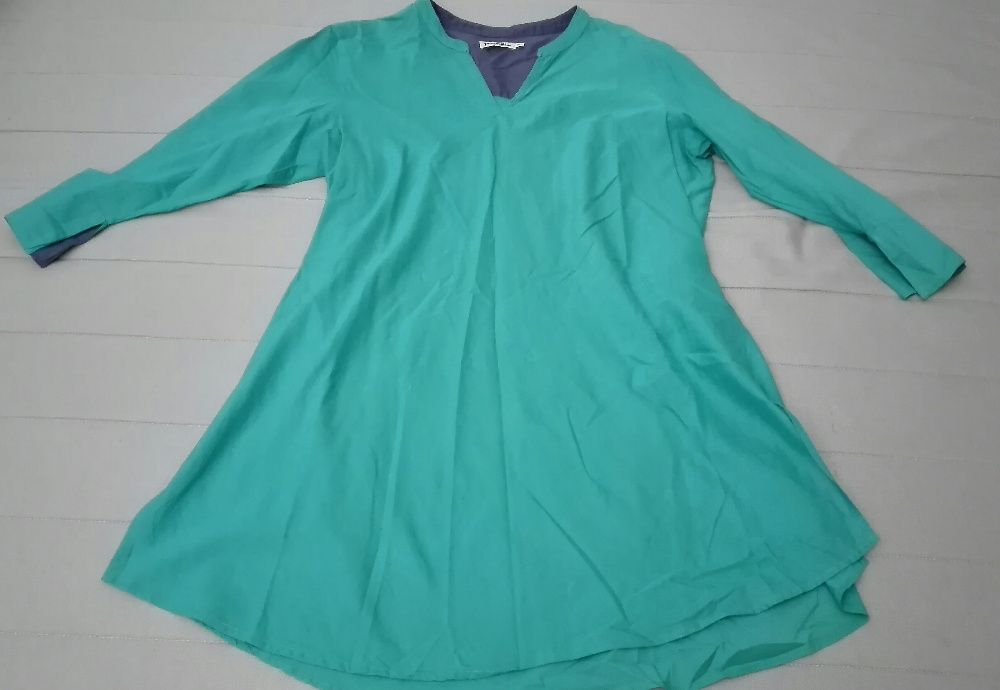 Blusas, túnicas e vestidos de marca