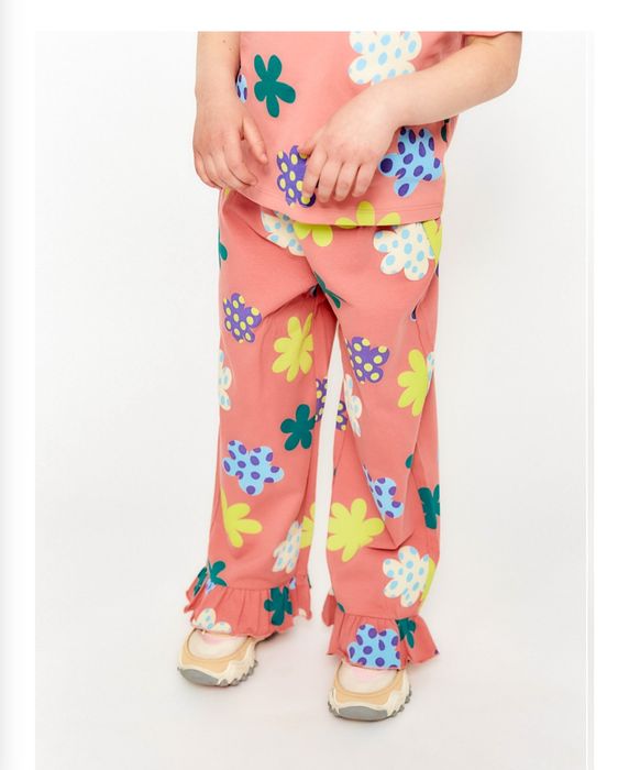 Spodnie dziewczęce dzianinowe w kwiatki - flary