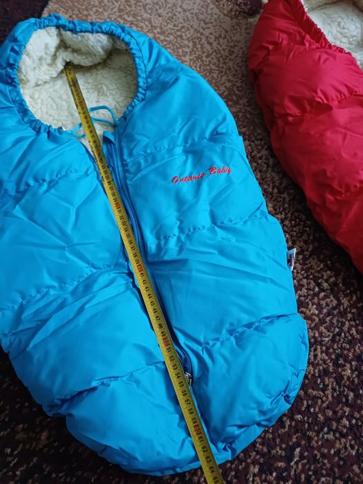 Конверт на Виписку!Продам два  зимових конверти в коляску на овчині.