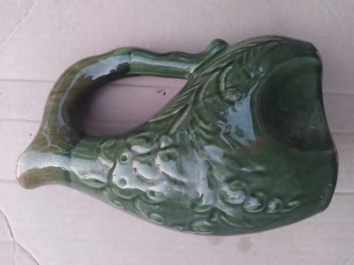 Кухоль з білої глини