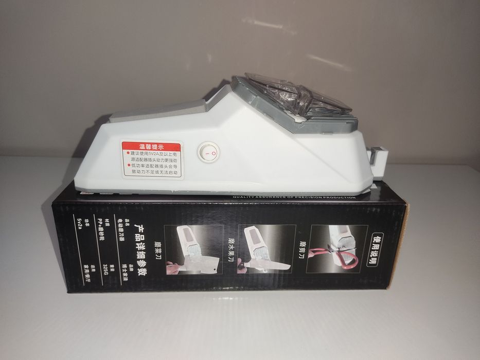 Електроточило для ножів і ножиць