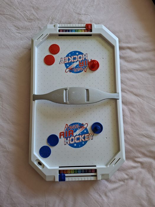 Jogo de air hockey