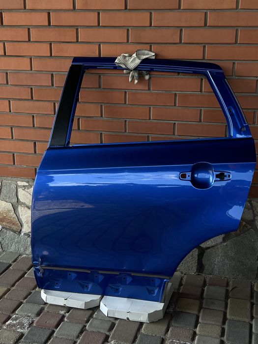 Левая задняя дверь Suzuki  сх4 с 2013г