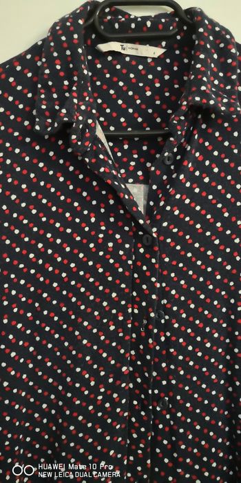 Koszula damska w groszki.