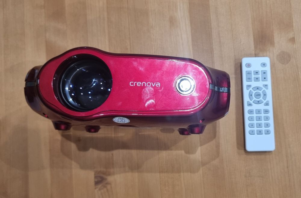 Crenova Red Projector + Remote Control — Excellent Condition64284390318594121