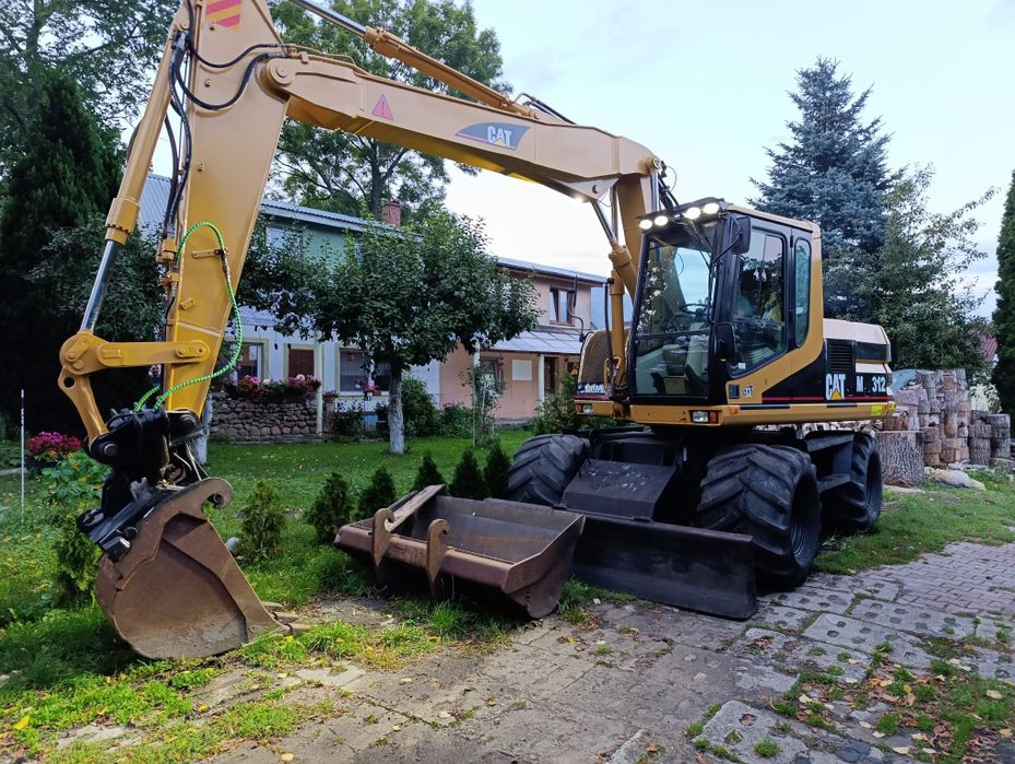 Usługi koparko-ładowarką/koparką kołową