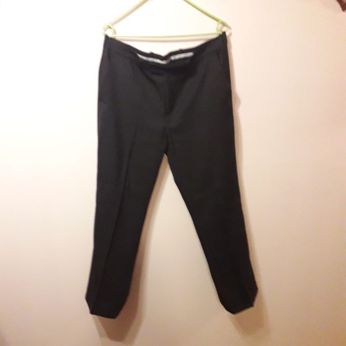 Nowe męskie  czarne spodnie garniturowe rozmiar M