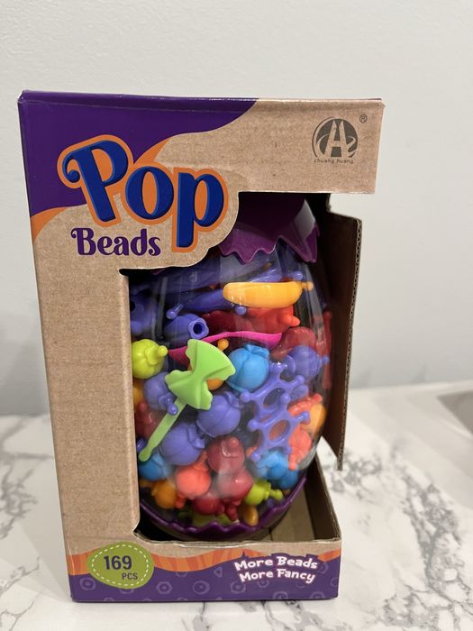 набір іграшкових намистин "Pop Beads".