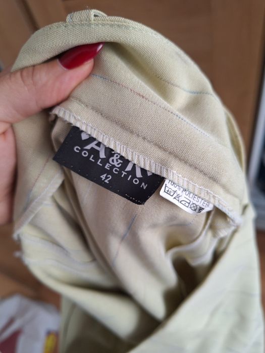 Eleganckie damskie spodnie garniturowe beżowe w paski 42 XL