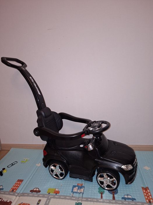 Машинка толокар дитяча