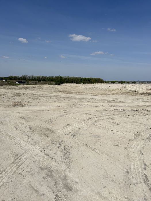 Вирівнювання ділянок підсипка засипка планування