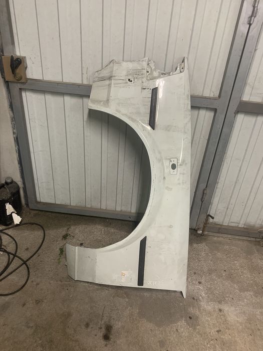 Guarda lamas esquerdo toyota corolla ke70