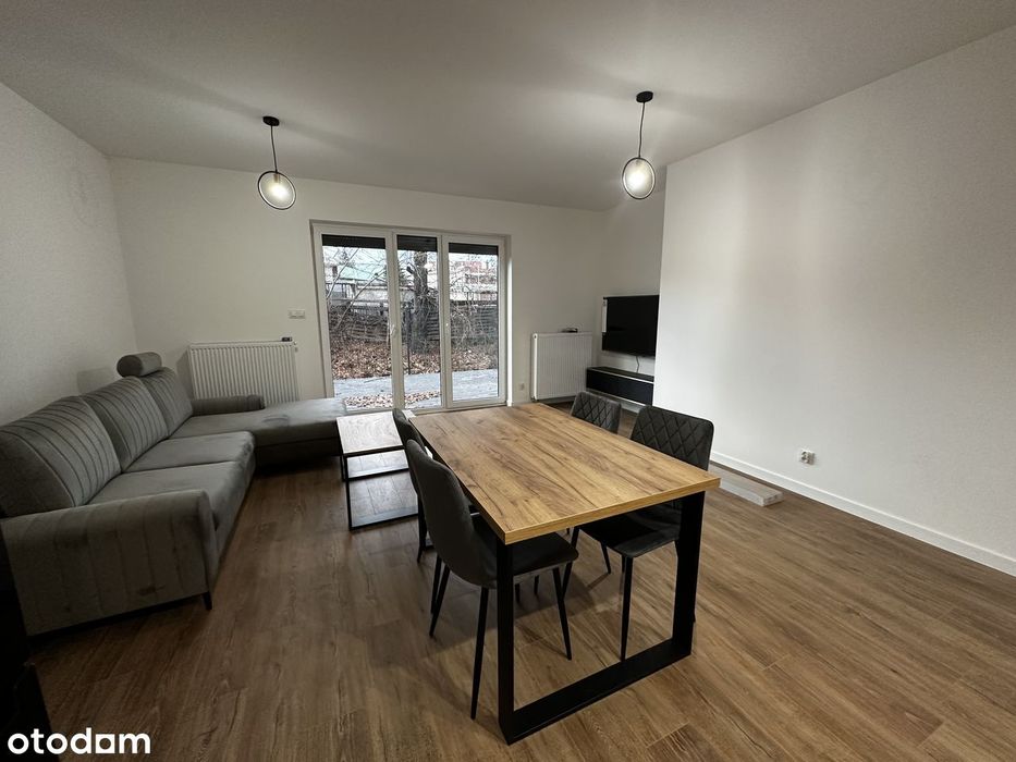 Nowe mieszkanie w centrum z ogródkiem
