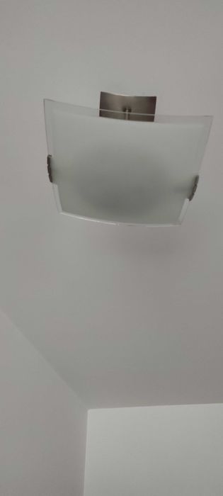 Candeeiros em aço inox e vidro fosco