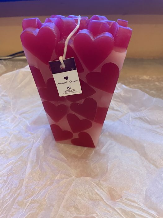 Velas novas pergumadas com  corações muito bonitas