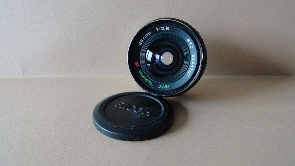 Lente OM Tokina 28mm/2.84