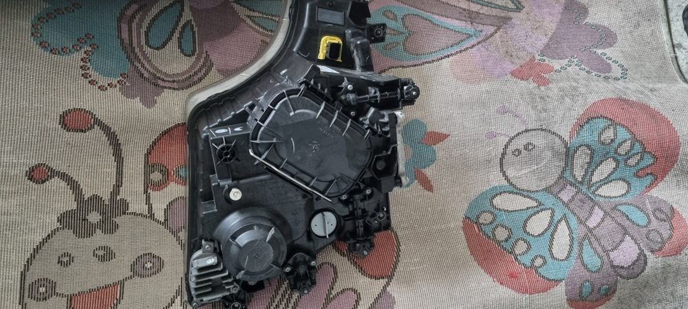 Lampa actros mp5 bixenon lewa strona