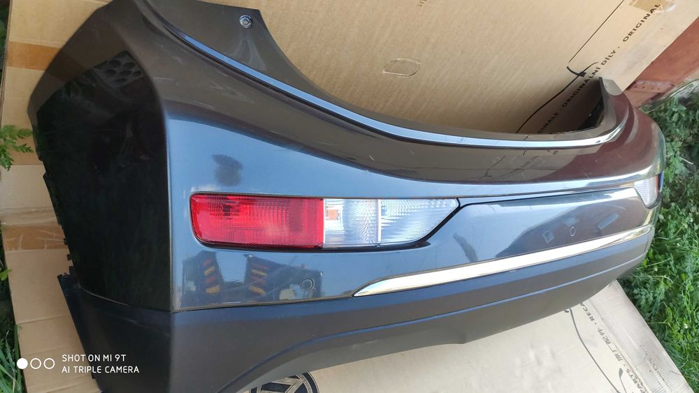 Бампер задній Chevrolet Bolt EV в зборі