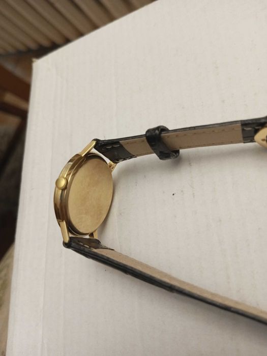 Omega Geneve złoty 18 K zegarek męski