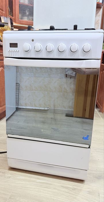Продам печку помбинированную Hotpoint  Ariston