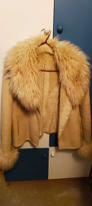 Elegancki kożuszek damski z paseczkiem