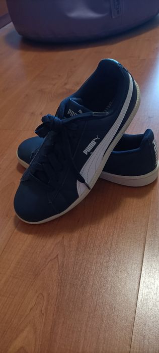 Tennis puma azuis escuros em pele