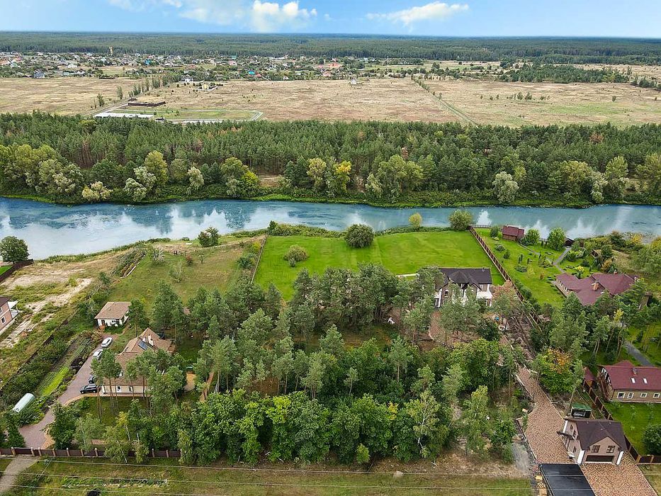 Лебедівка. Будинок в КМ «Dream Village» на ділянці 0,72 га з виходом на Дніпровський канал