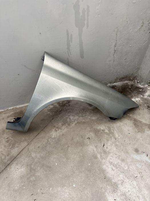 Guarda-lamas Direito Renault Laguna II – Original