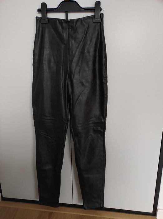 Skórzane, kobiece dopasowane spodnie H&M r. 36