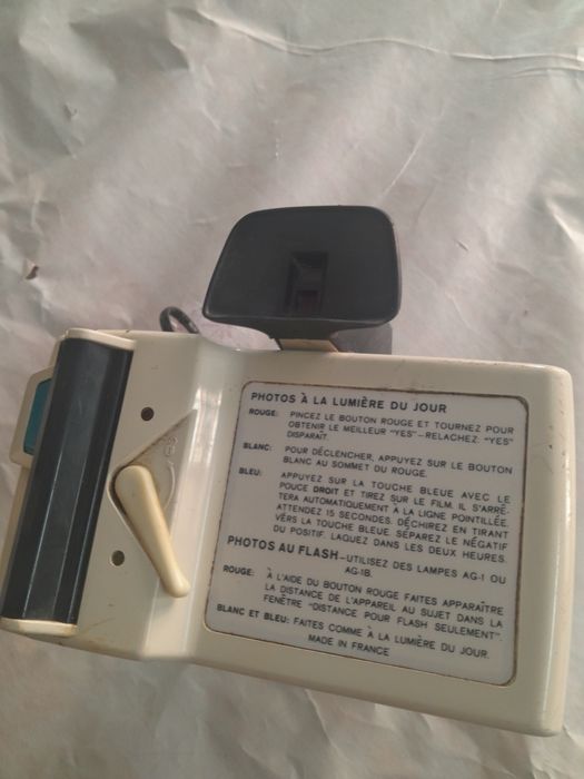 Máquina fotográfica Polaroid Swinger (vintage)