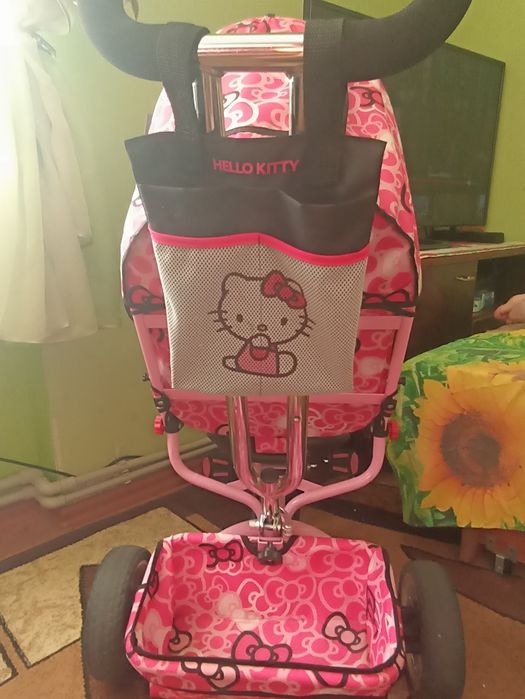 Дитячий трехколісний велосипед з батьківською ручкою Hello kitty.