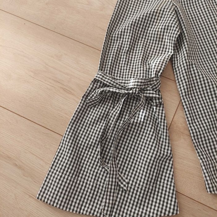 Bluzka C&A z aplikacją