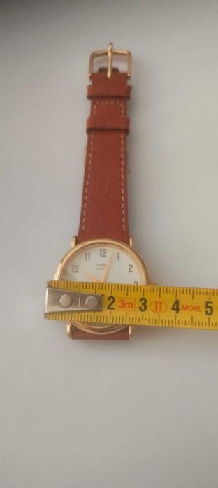 Timex, em estado novo, dourado