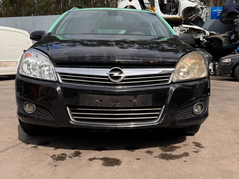 Pára-choques frente OPEL Astra H Caravan Van (L70)