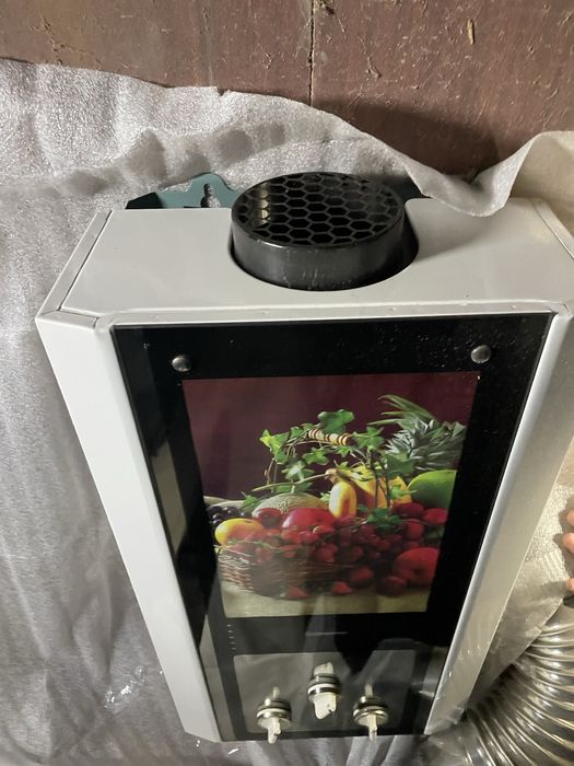 Газова колонка/водонагрівач Krauf (або без бренду) – робоча