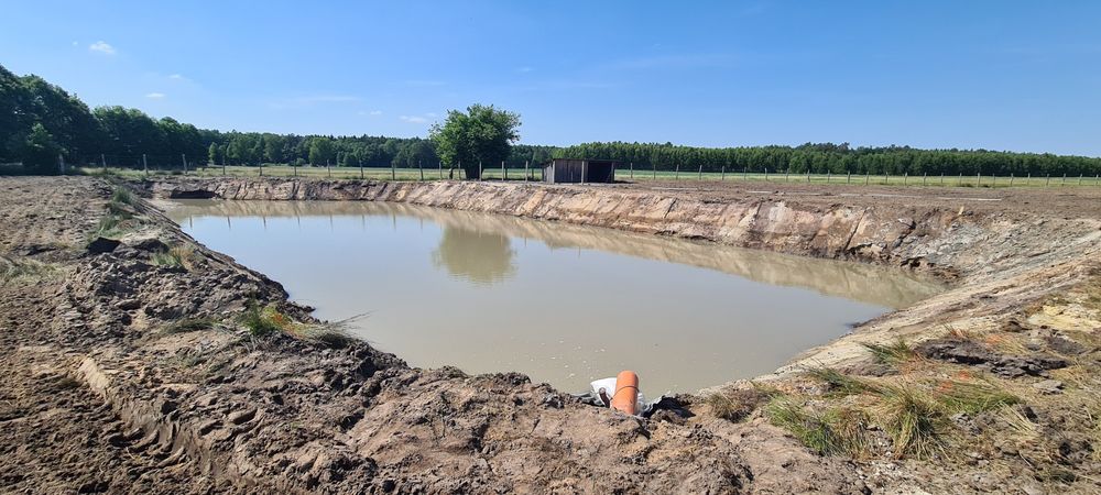 Wymiana gruntu pod dom stawy jeziorka koparka