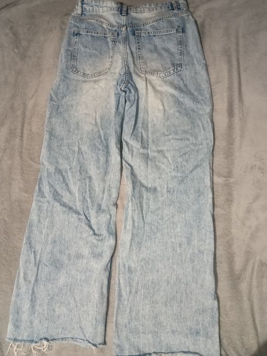 Широкі сині джинси