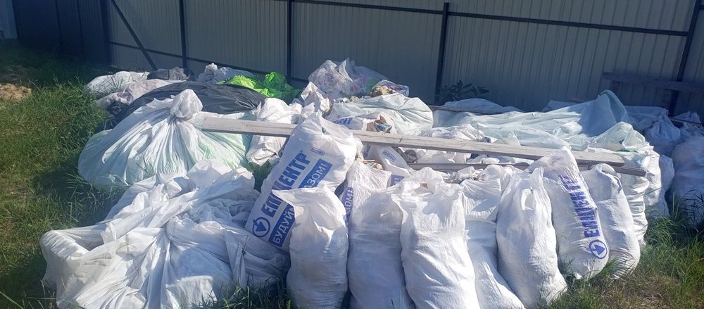 Вивіз сміття з вантажниками