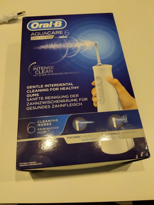 Irrigador oral para higiene bocal