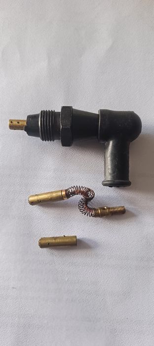 Szczotkotrzymacz do pracy w oleju