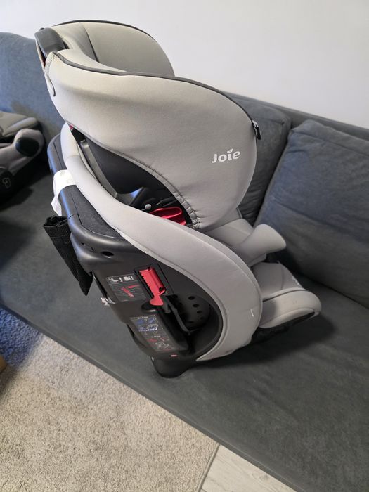 Fotelik samochodowy joie stages 0-25 kg na pasy bezpieczeństwa
