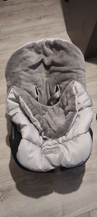 Fotelik dla niemowlaków z isofixem oraz śpiworkiem