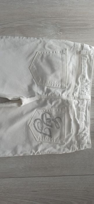 Białe z dżinsowego streczu rurki Guess. R 152 cm. Stan bardzo dobry.