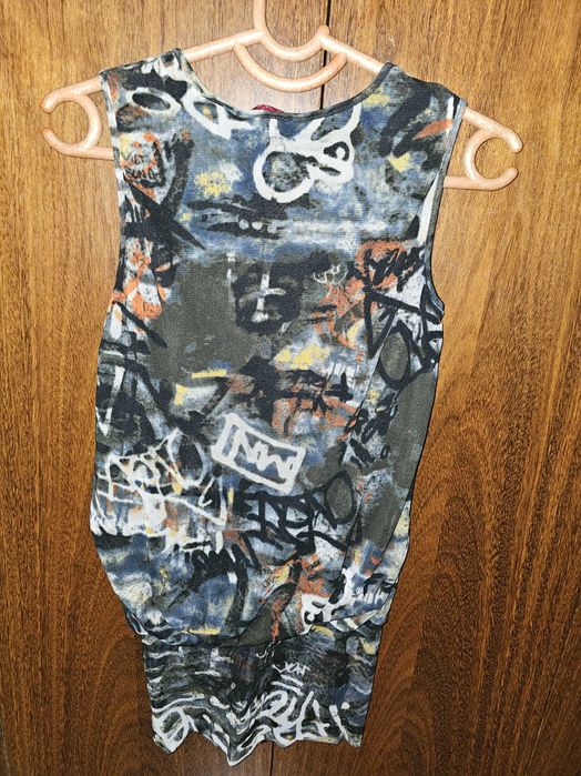 Túnica decote em bico Grupo Escada