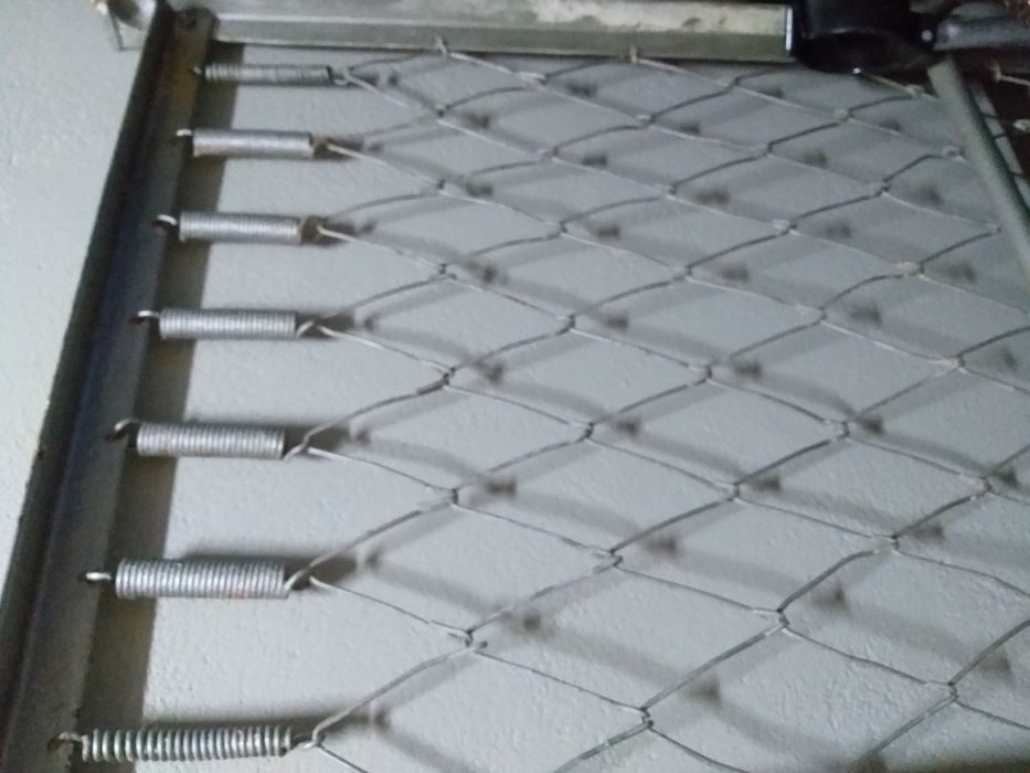 Cama de ferro de solteiro