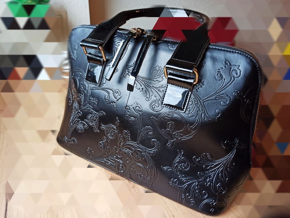 Красивая и удобная сумка из натуральной кожи