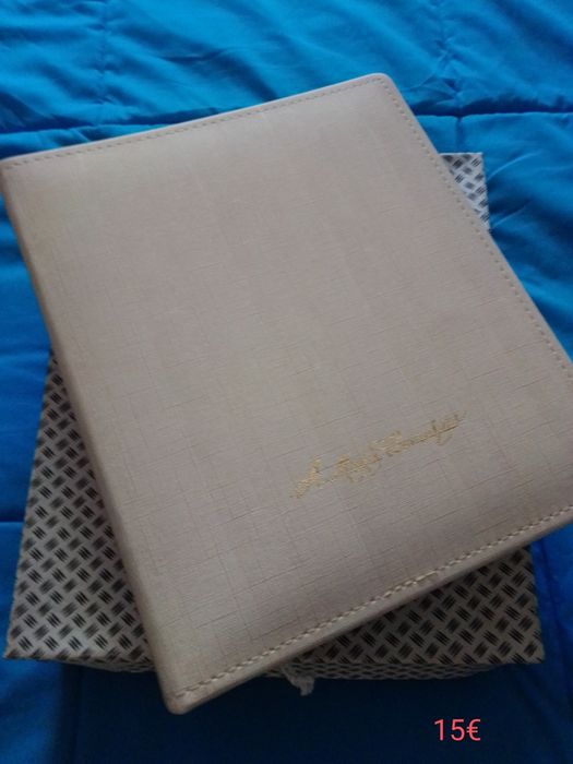 Vendo álbuns para fotos de primeira comunhão.