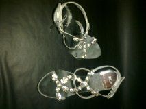 Sapatos de luxo exclusivos como novos